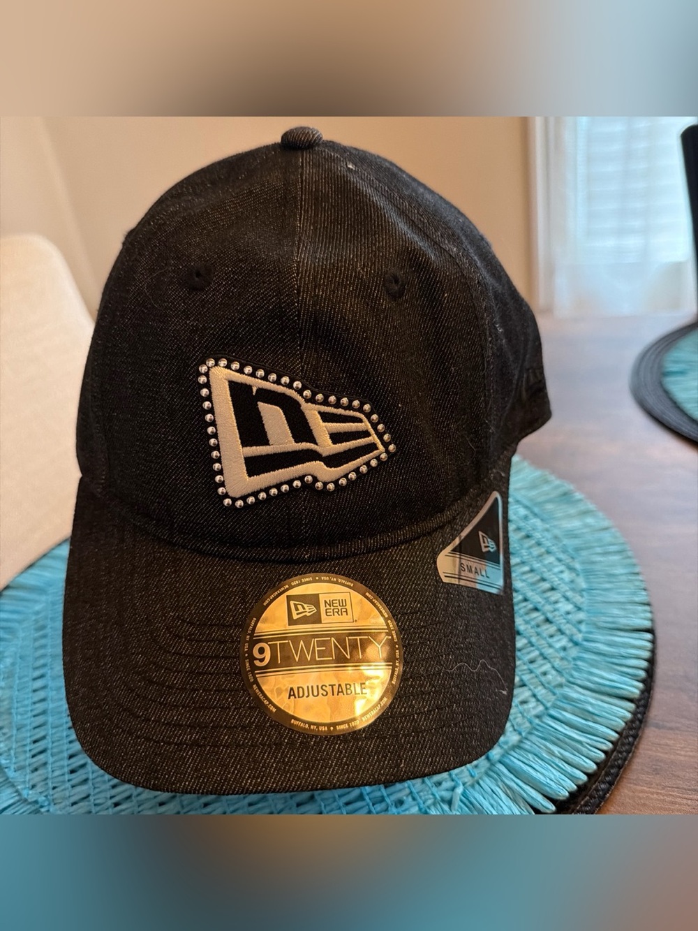 New Era Black Cap with Studded Logo and White Accent
